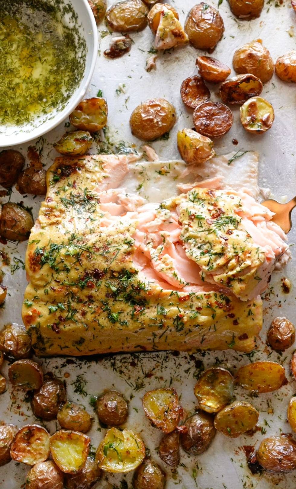 Sheet pan salmon with potatoes and dill butter.